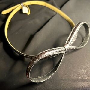 WHBM NWT  Cute Silver fake snakeskin bow belt. Size XS